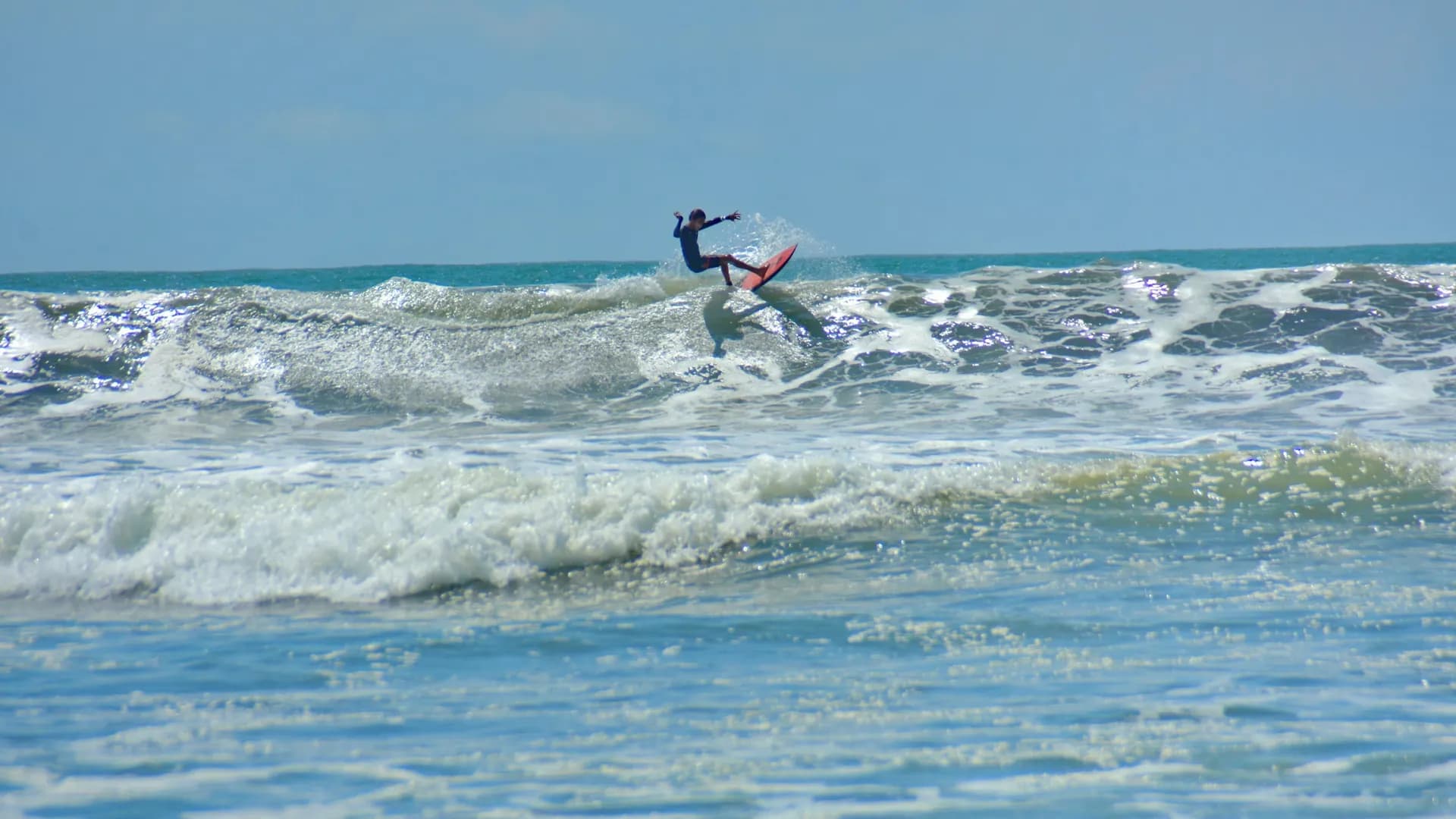 A surfer turns on a breaking wave in Costa Rica.